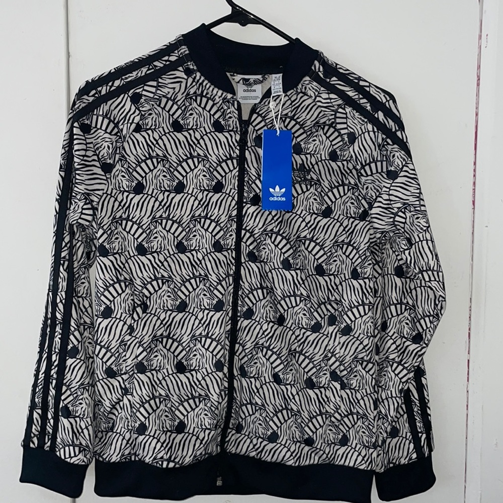 I am selling a never worn adidas sweater